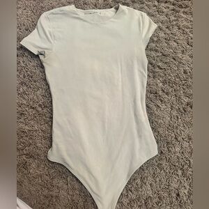 Cream body suit
